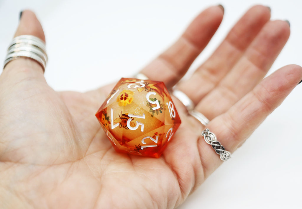 33mm Sharp Edge Liquid Core D20 - Orange Blossoms Plastic Dice Foam Brain Games